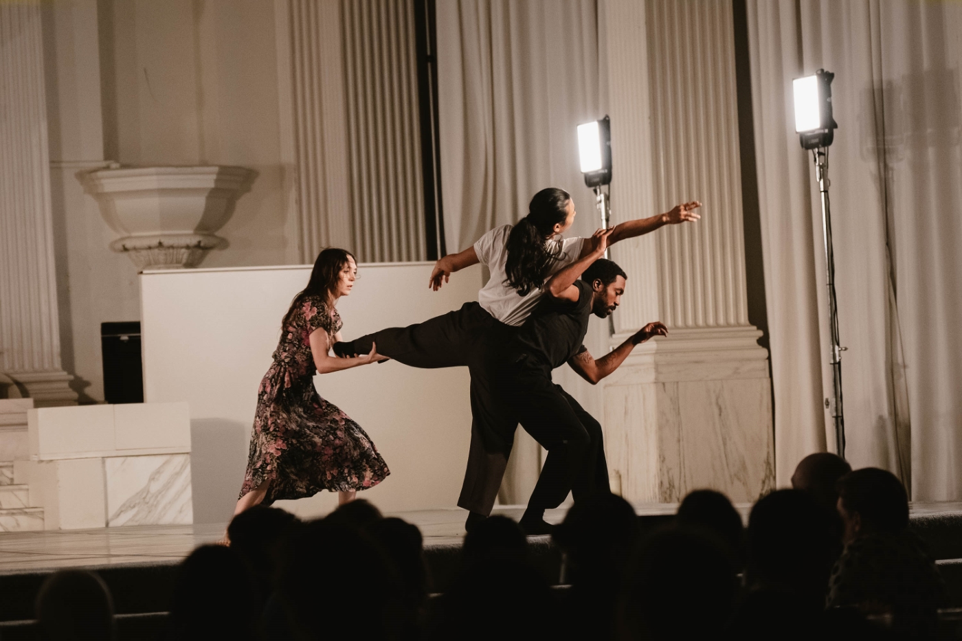 a trio of dancers work collaboratively on a dance move at a dance gala performance at Vibiana in downtown Los Angeles