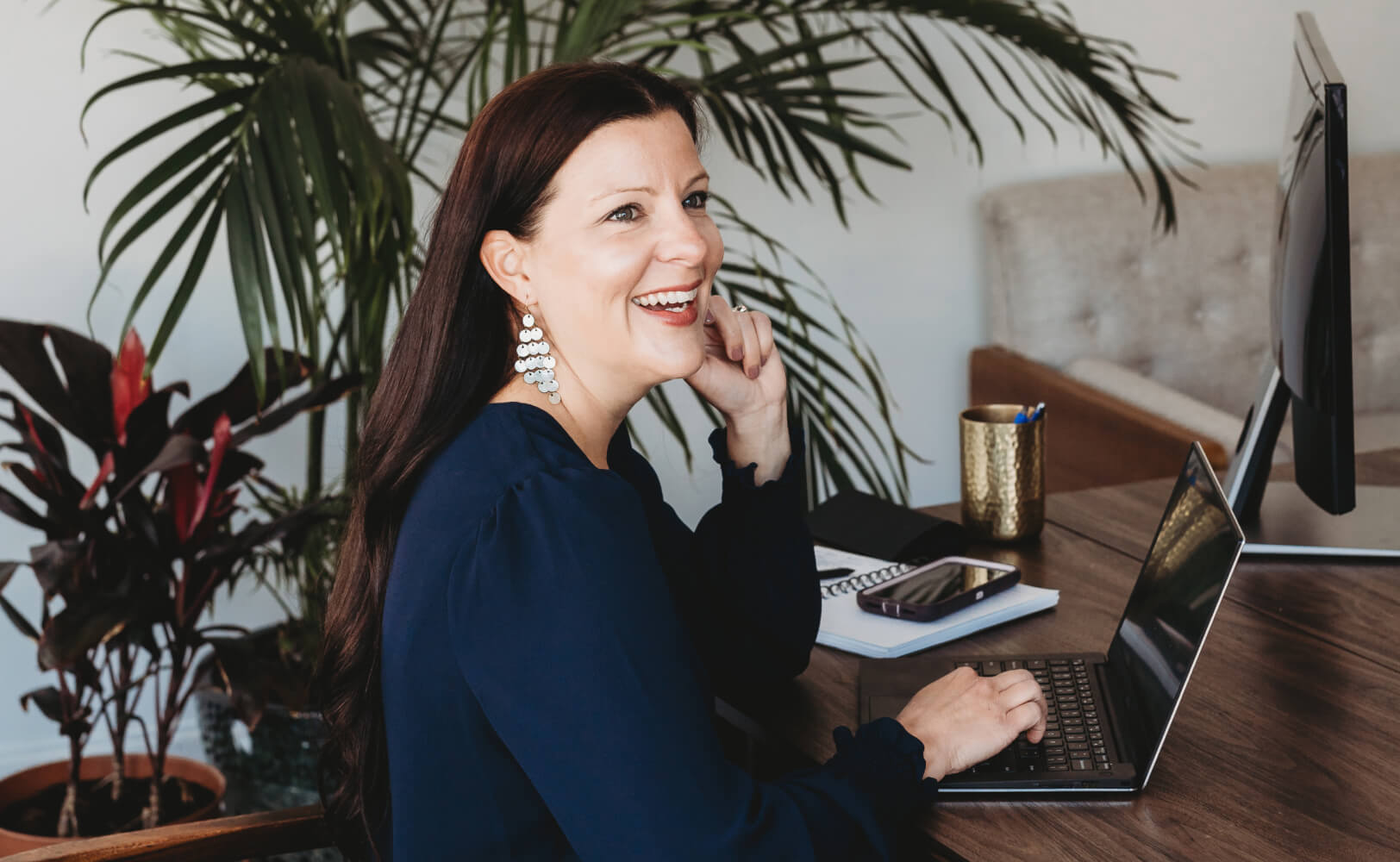 Entrepreneur using Dell computer at remote office