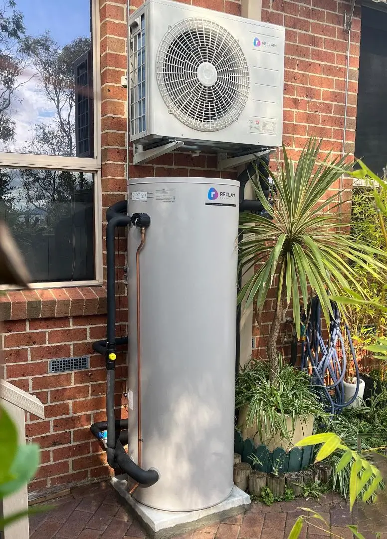 Hot water heat pump outside a home