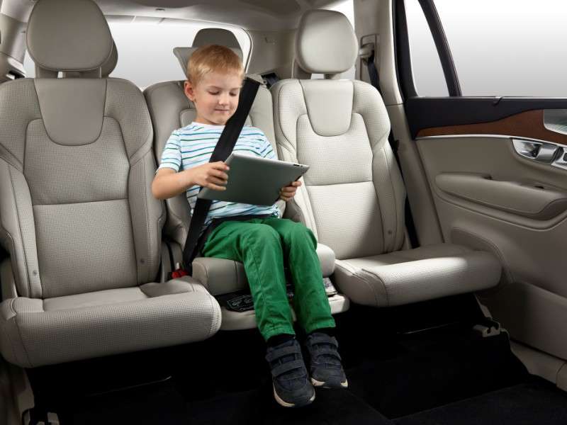 child in volvo built-in booster seat 