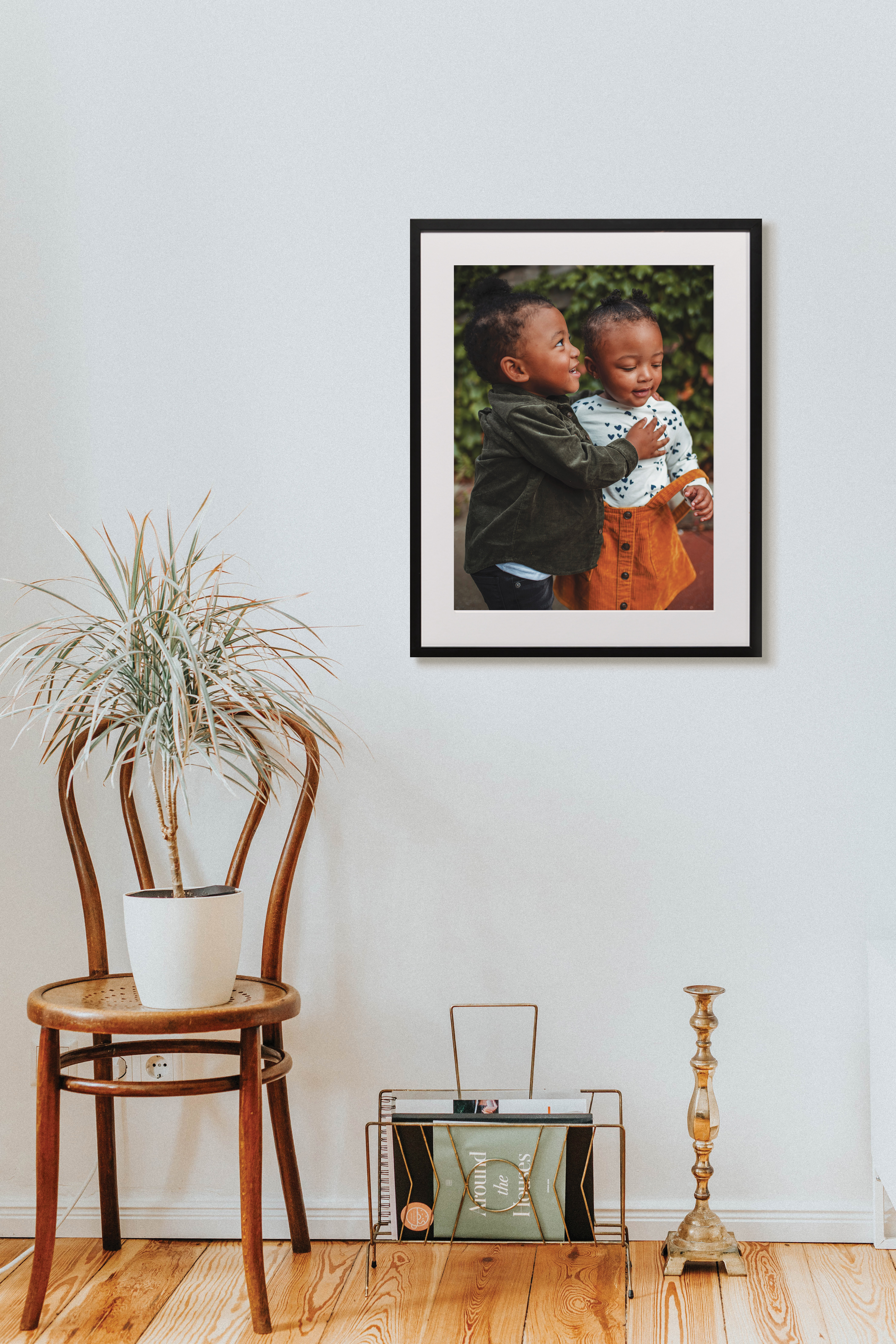 Framed print in living room of two children playing