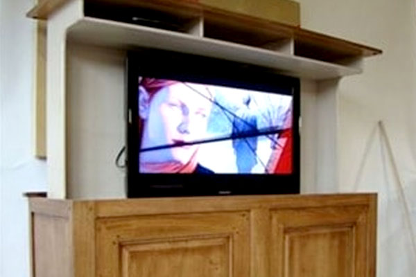 Motorized TV lift in cabinet 