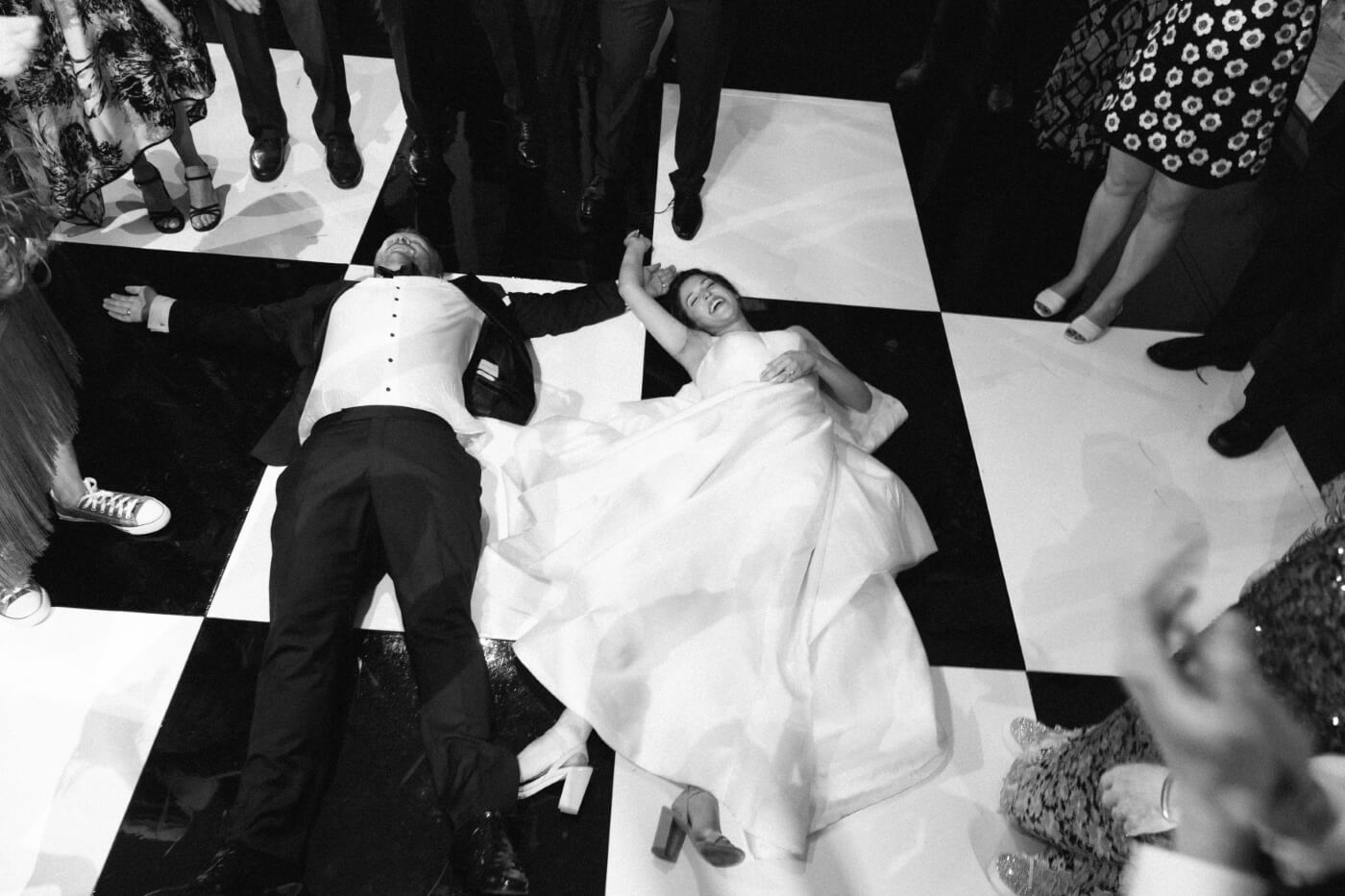 bride and groom on ground
