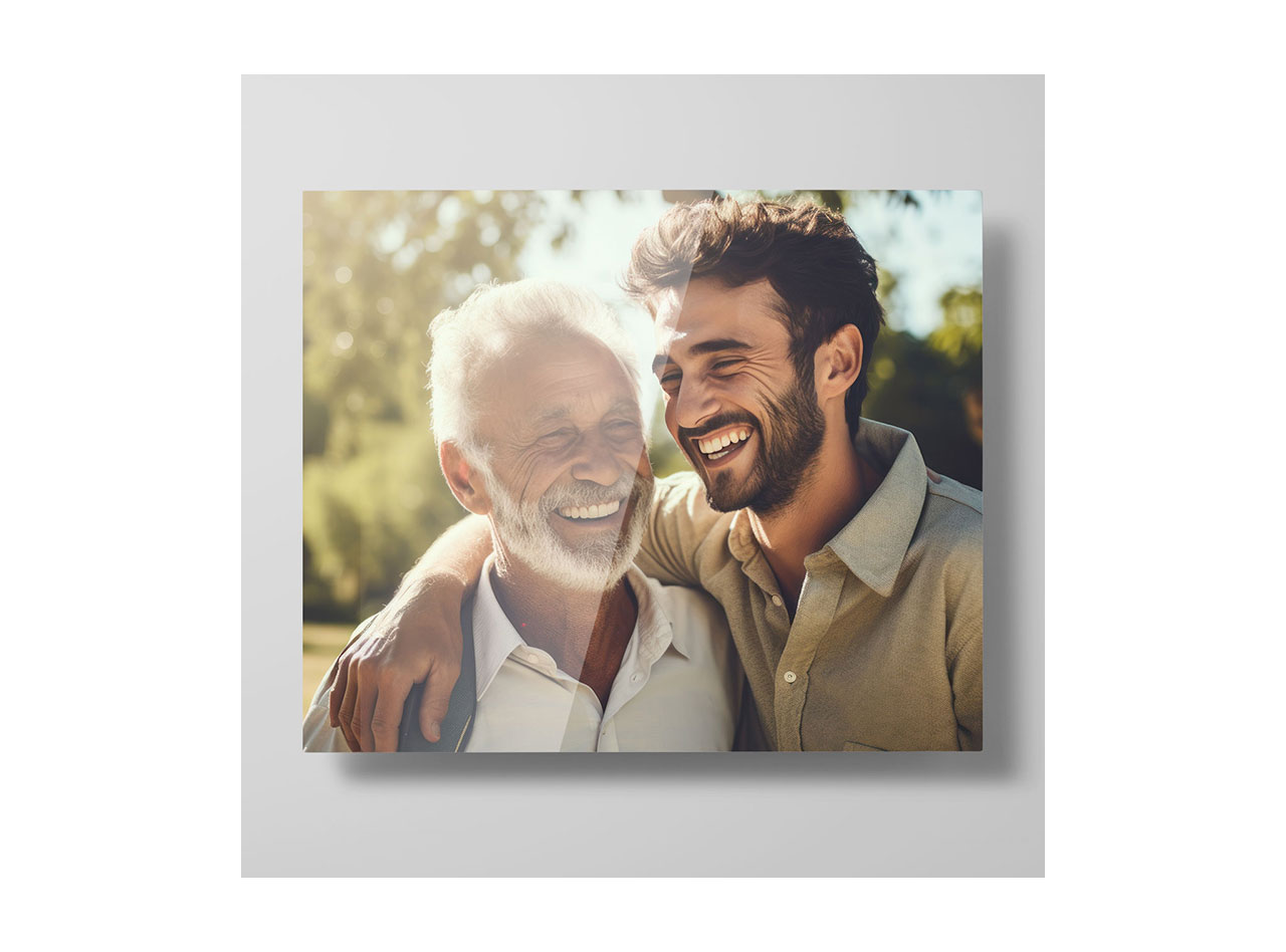 A metal print showcasing a candid image of a father and son laughing together