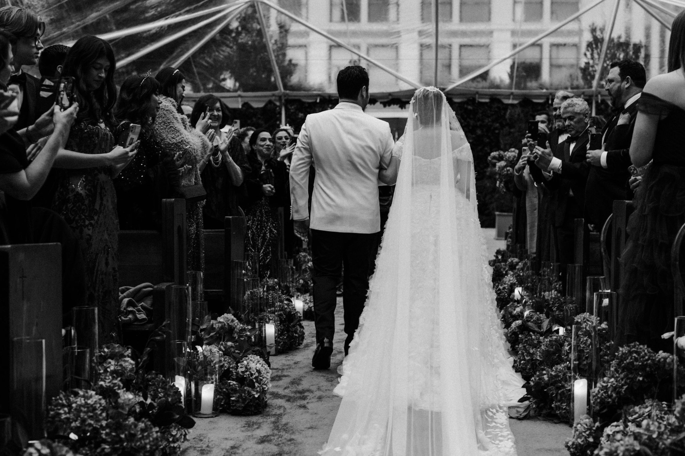 bride and groom walk down the aisle at their DTLA ballroom outdoor wedding