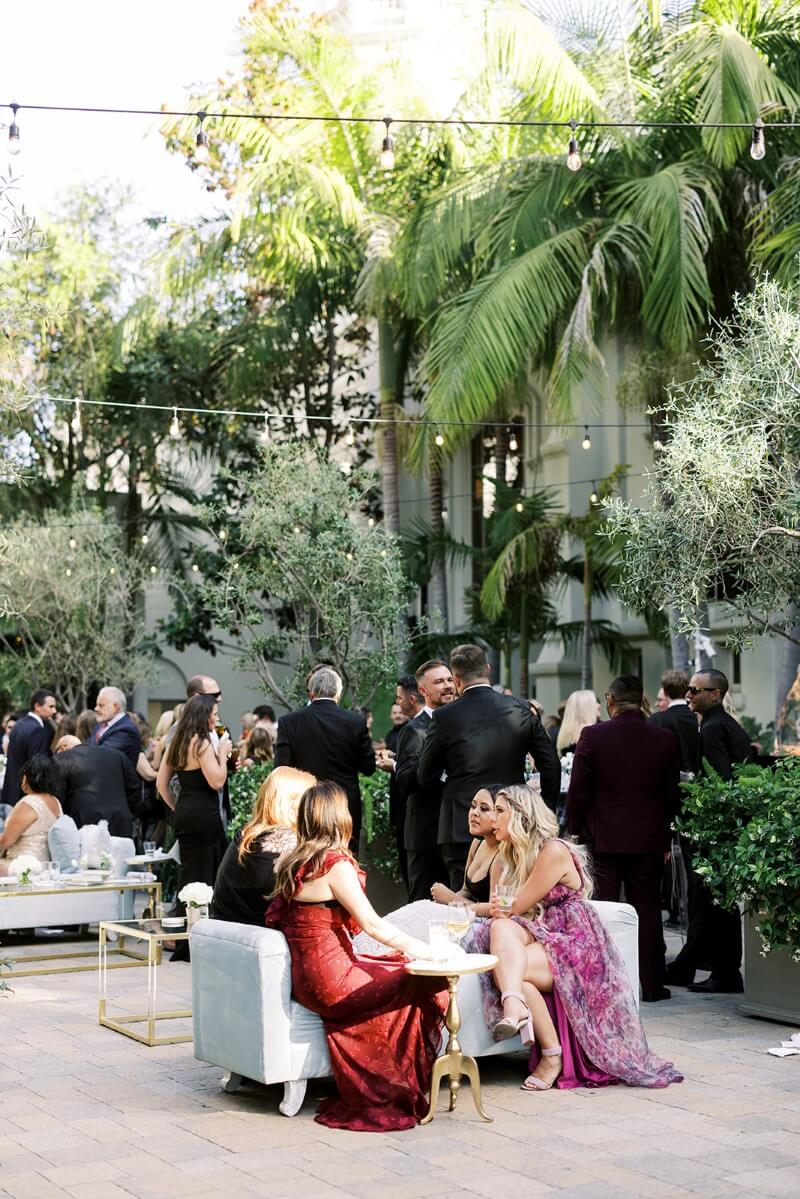 wedding guests in courtyard 
