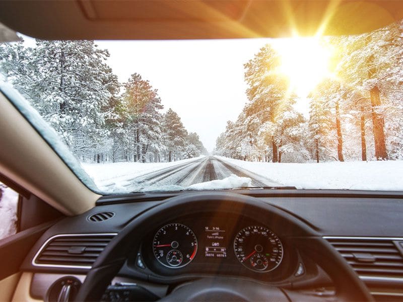 Icy Road Winter Drive ・  Photo by Bigstock 