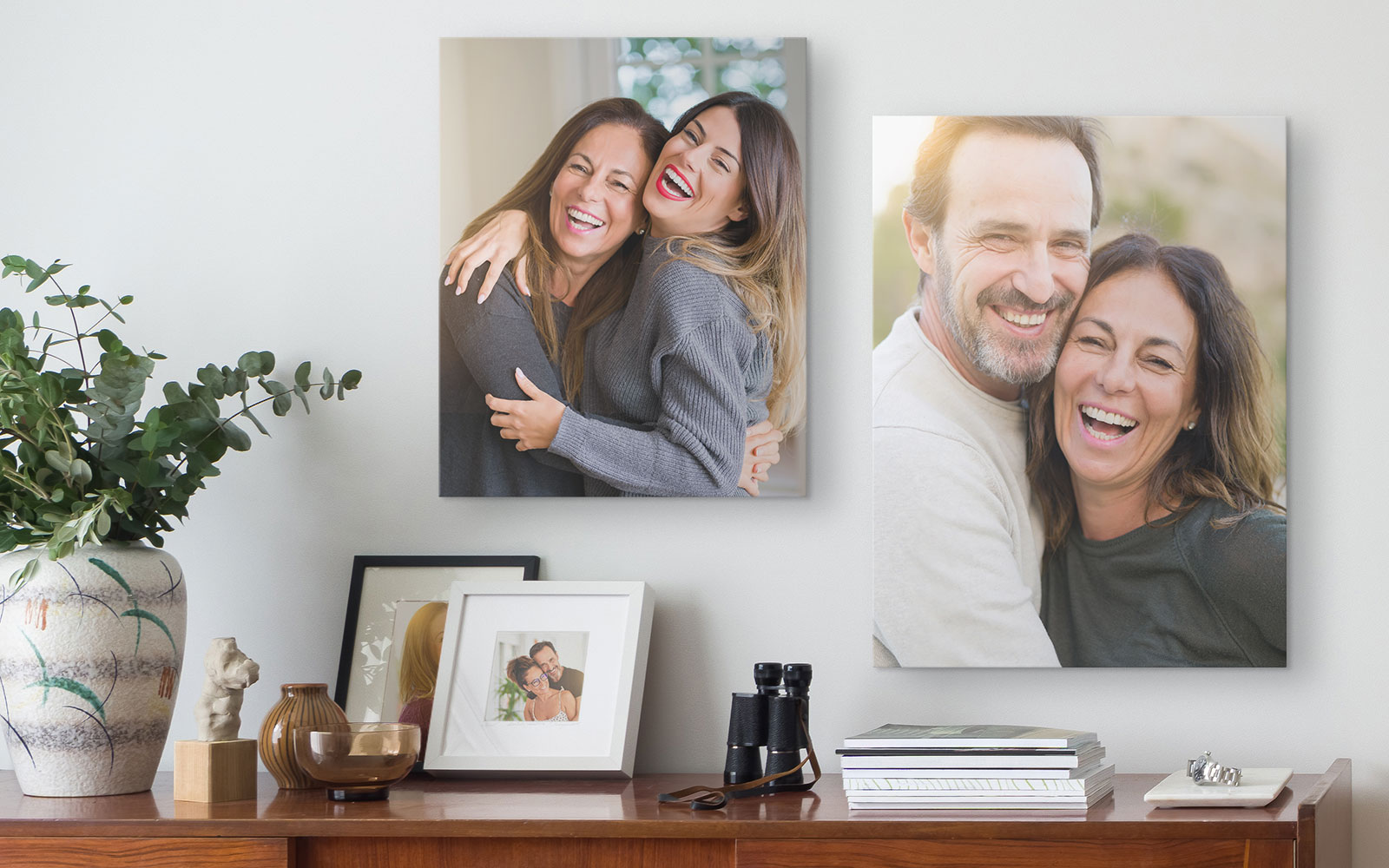 16x20 and 18x24 inch canvases showcase photos of a happy family laughing together