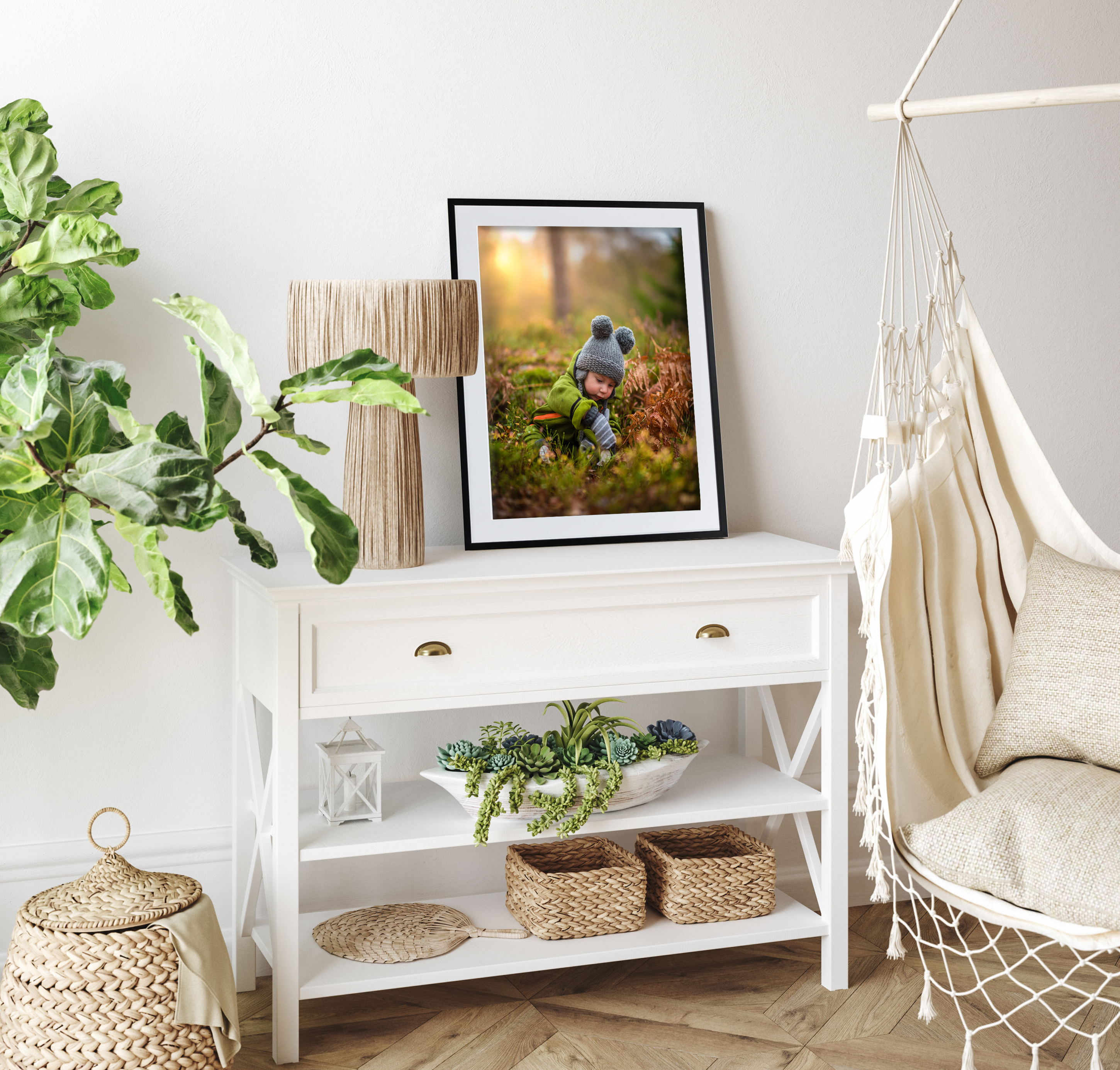 Framed print of child playing with leaves
