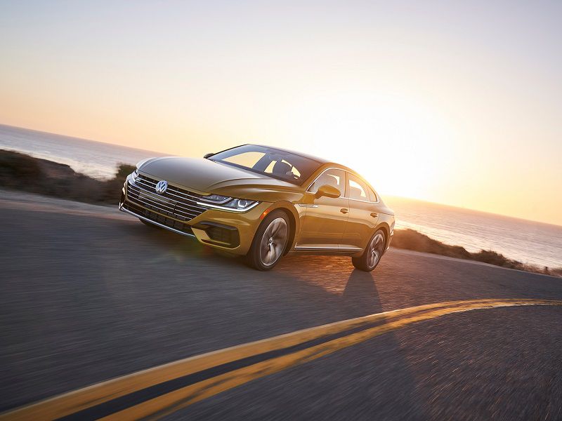 2019 Volkswagen Arteon Gold Driving Front Three Quarter ・  Photo by Volkswagen 