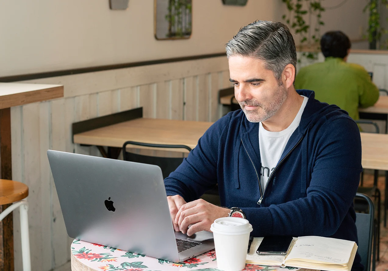 happy man checking his reports