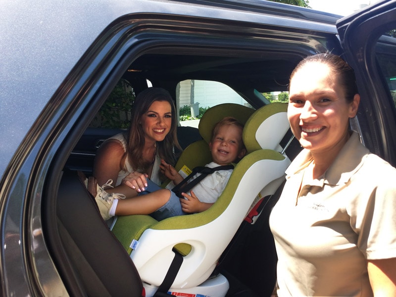 CHP officer with mom and child in car seat 