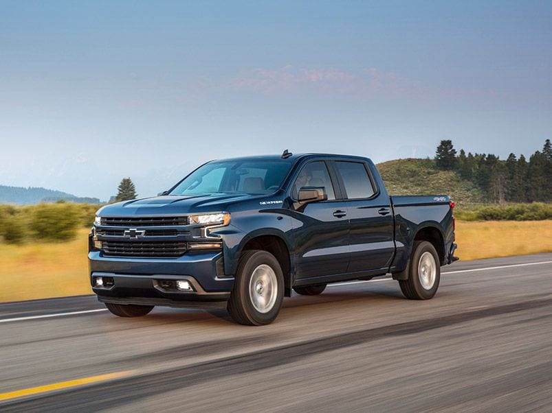 2019 Chevrolet Silverado RST profile driving ・  Photo by General Motors