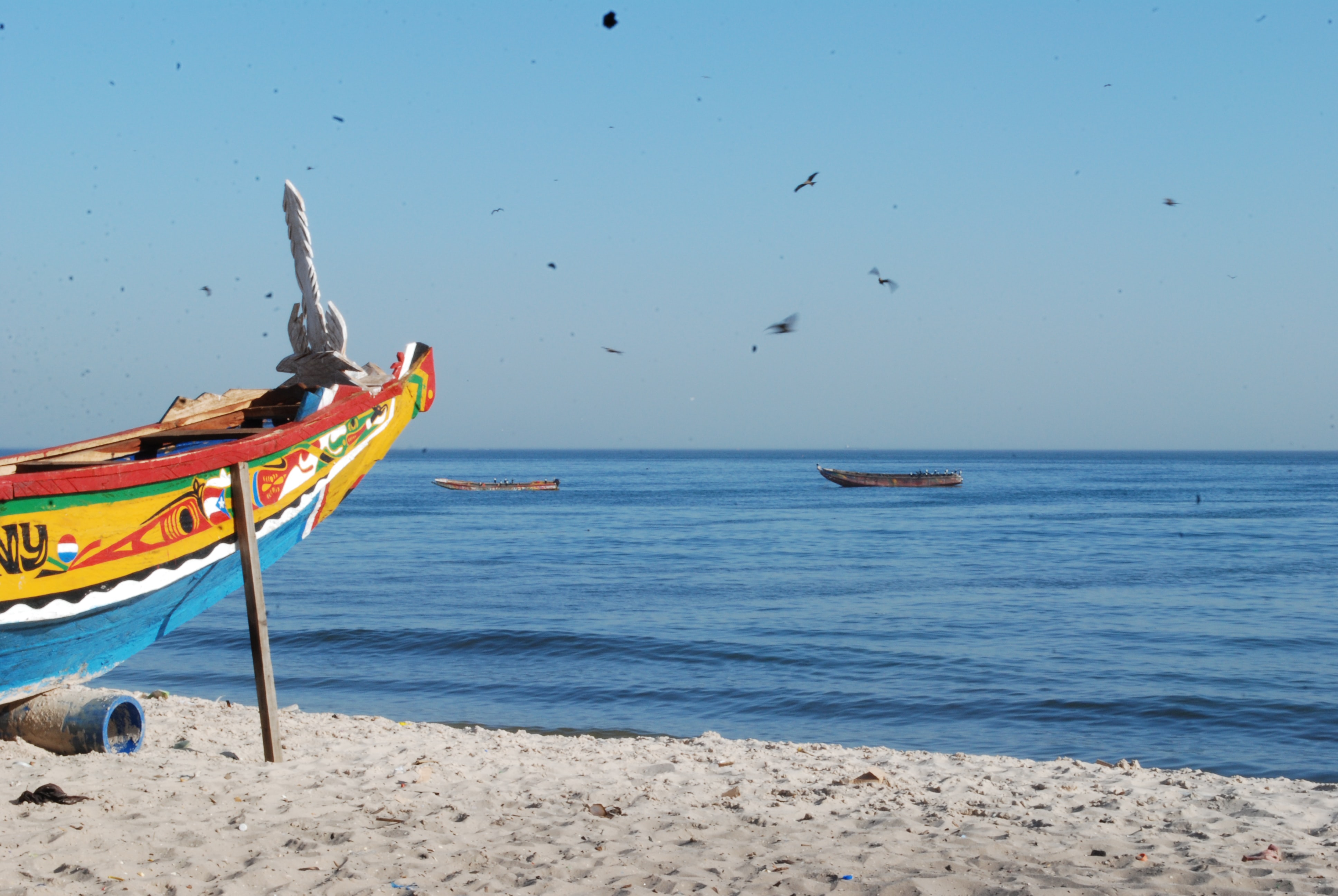 Colorful fishing boat on a beach in Senegal