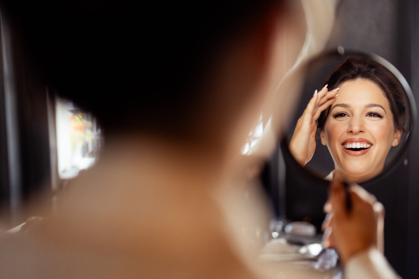 bride with mirror