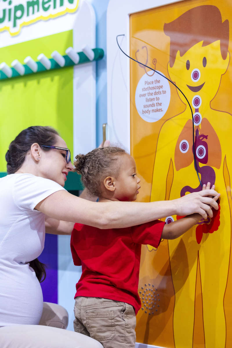 Try on different health-care roles in the St. Joseph’s Children’s Hospital exhibit.