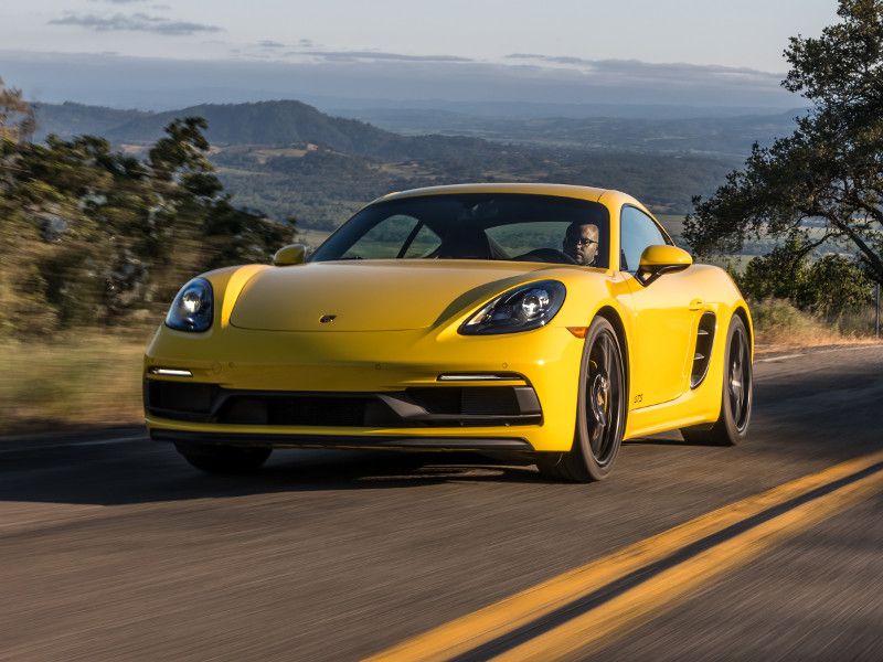 2021 Porsche 718 Cayman GTS driving on road ・  Photo by Porsche 