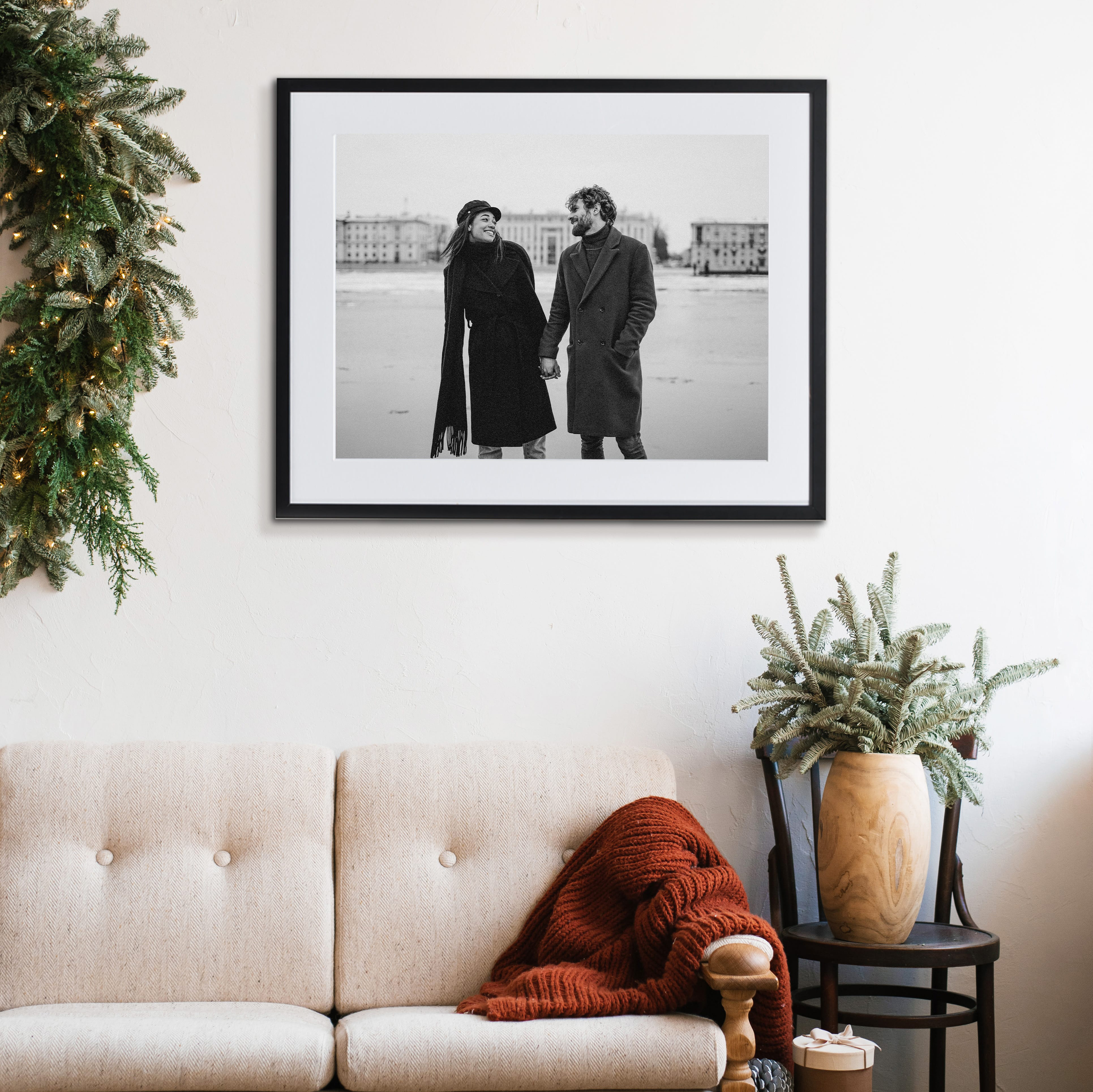 Framed print in living room of couple.