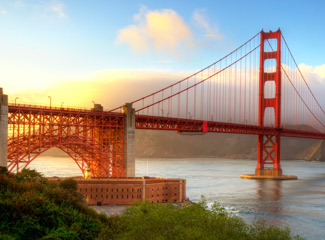 The sun rising at the San Francisco Golden Gate Bridge