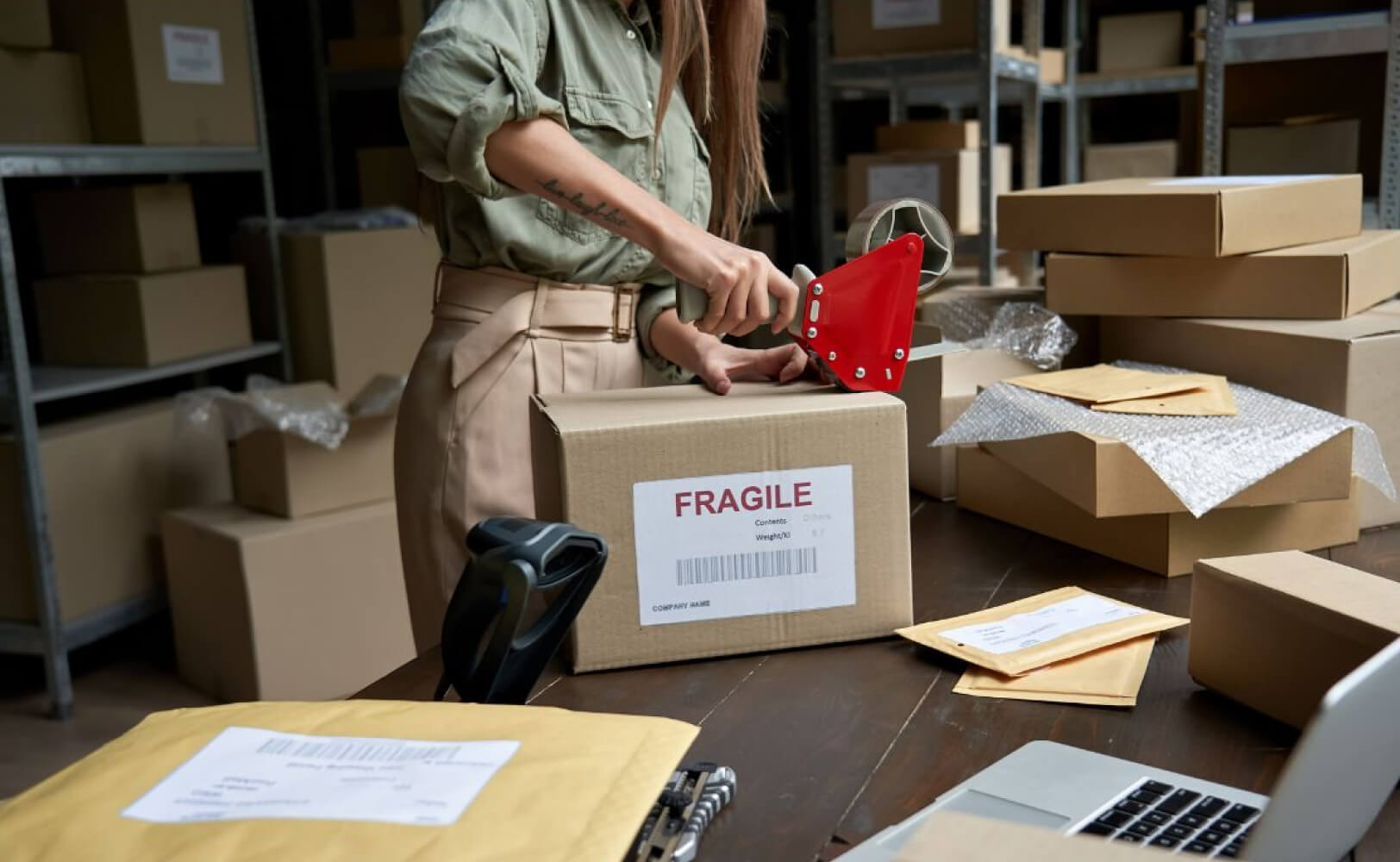 Women packaging products for FedEx program