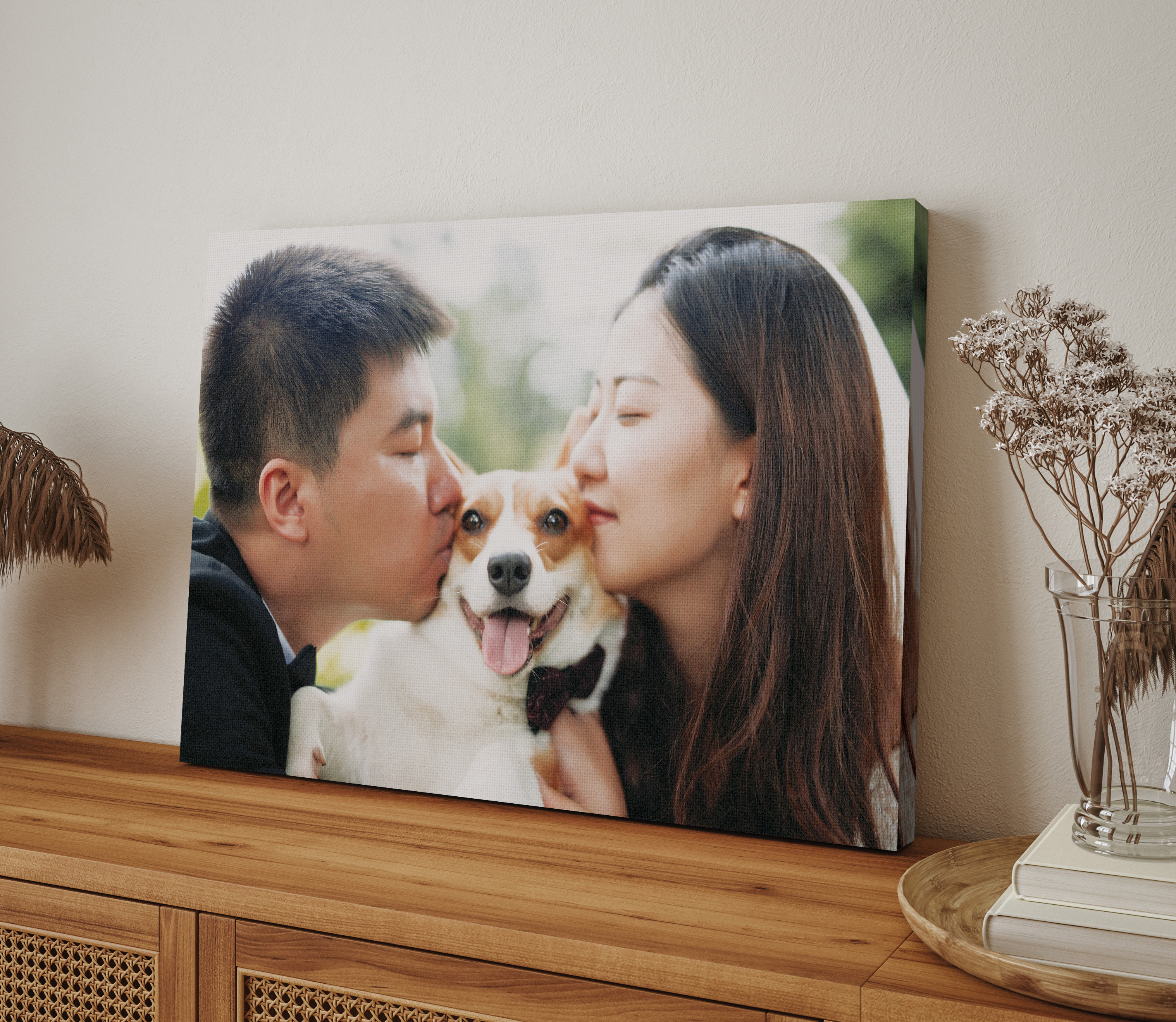 Canvas print of couple with dog on table