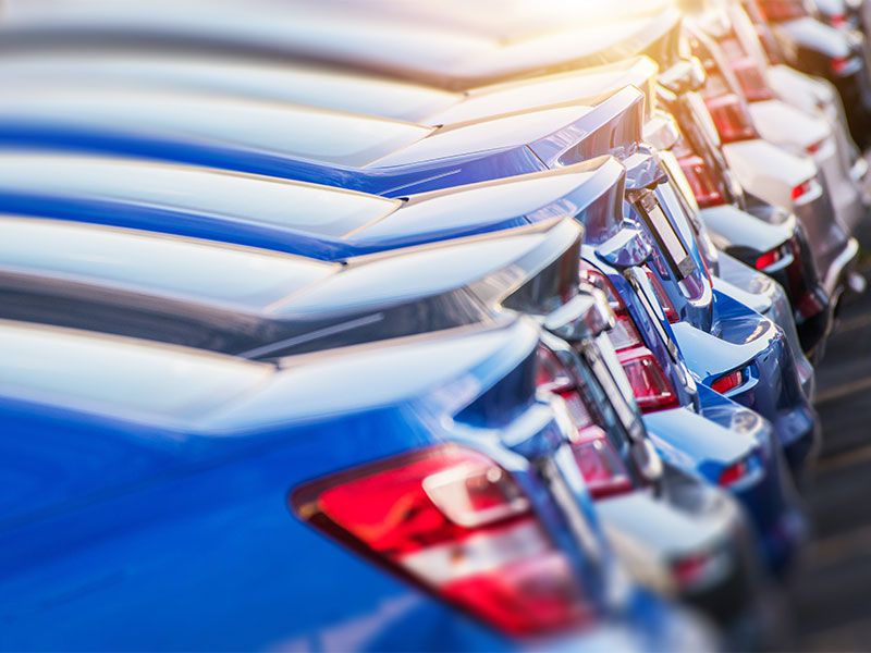 iStock cars at dealership on lot ・  Photo by iStock Photo