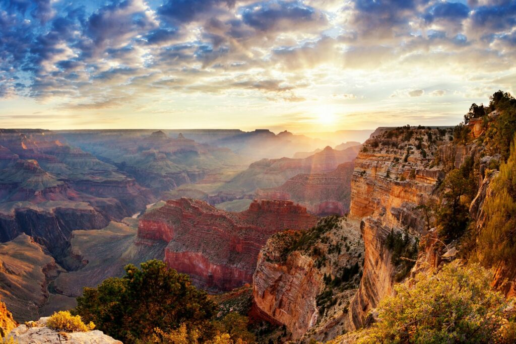 The sun shining bright over the grand canyon