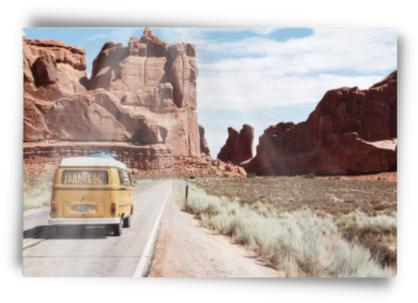 A camper van driving through the mountains printed on a metal frame