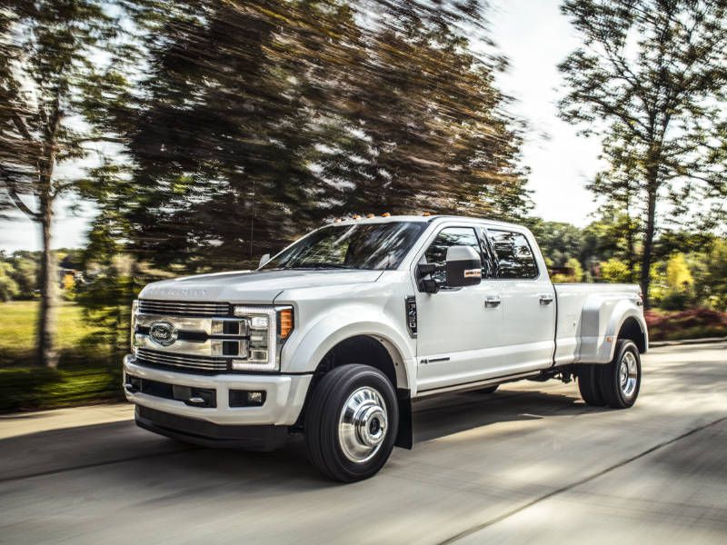 2018-Ford-F-450-Super-Duty-Limited-front-three-quarter-driving.jpg