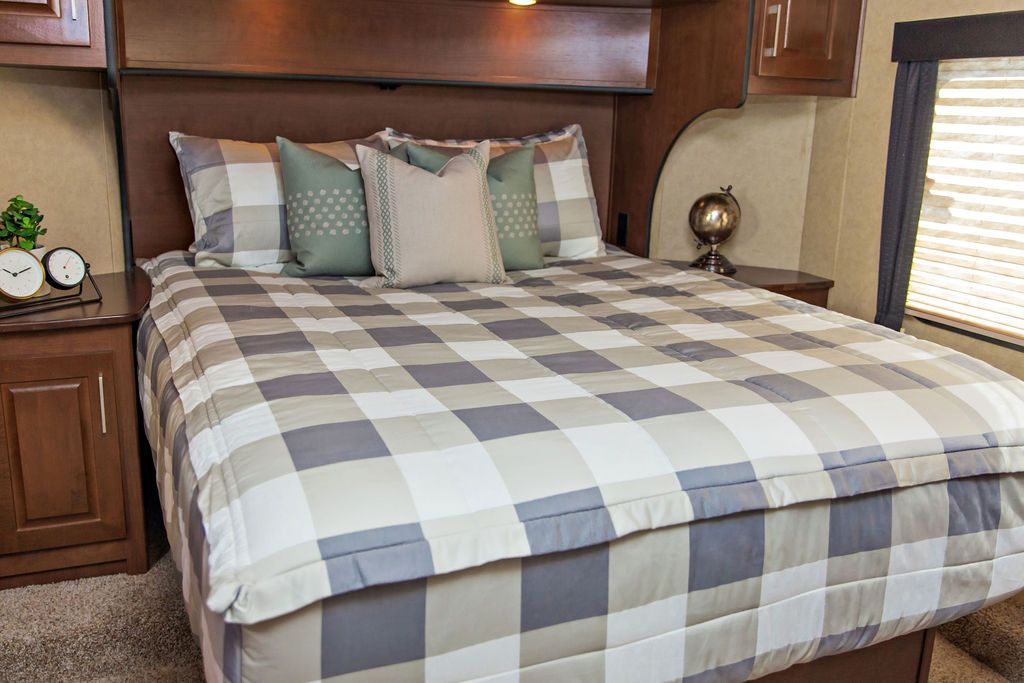 Adding new bedding to your RV's bedroom can really spruce up the space.