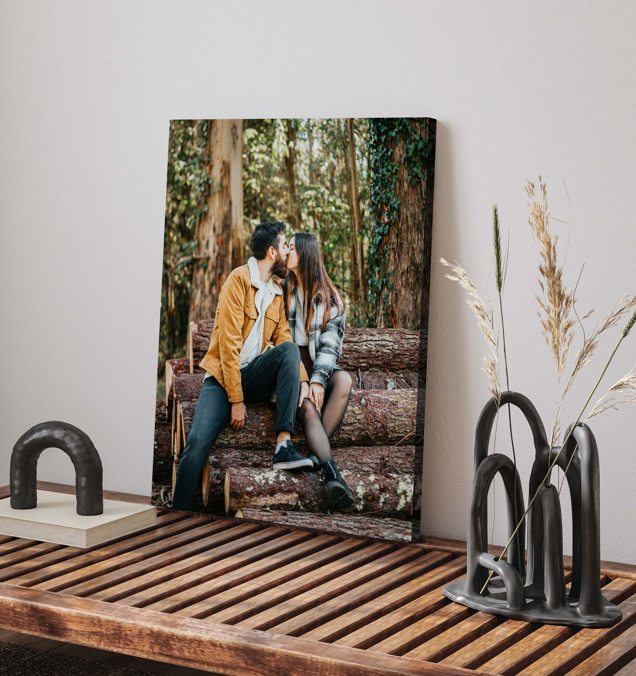 couple kissing in the forest