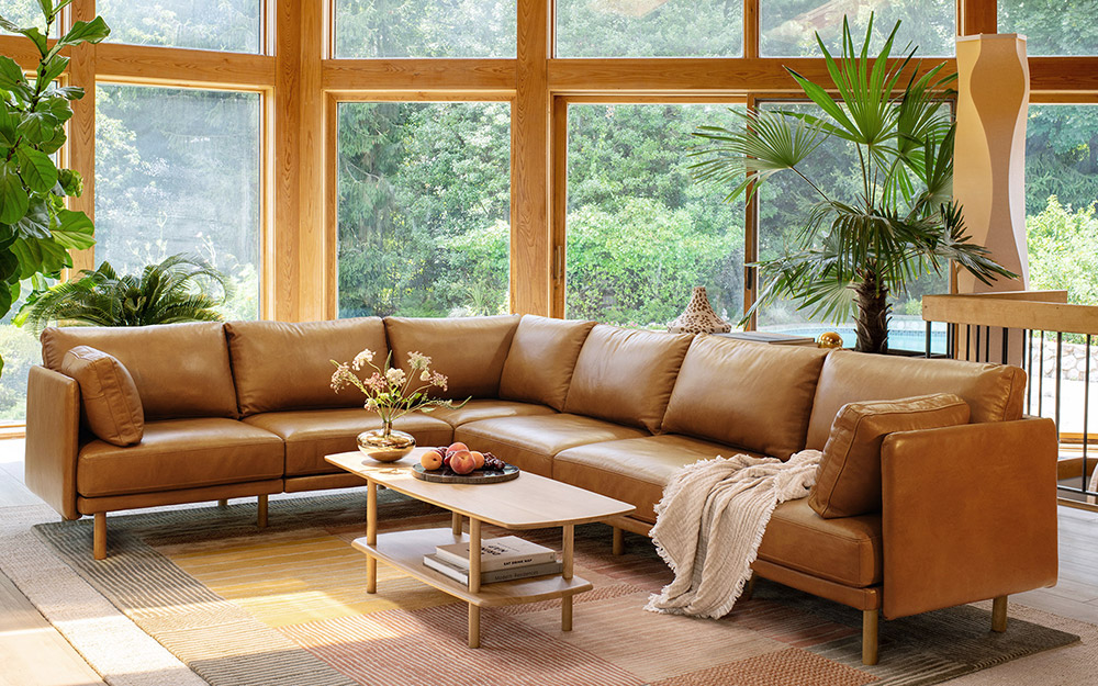 Plush tan leather deals sofa