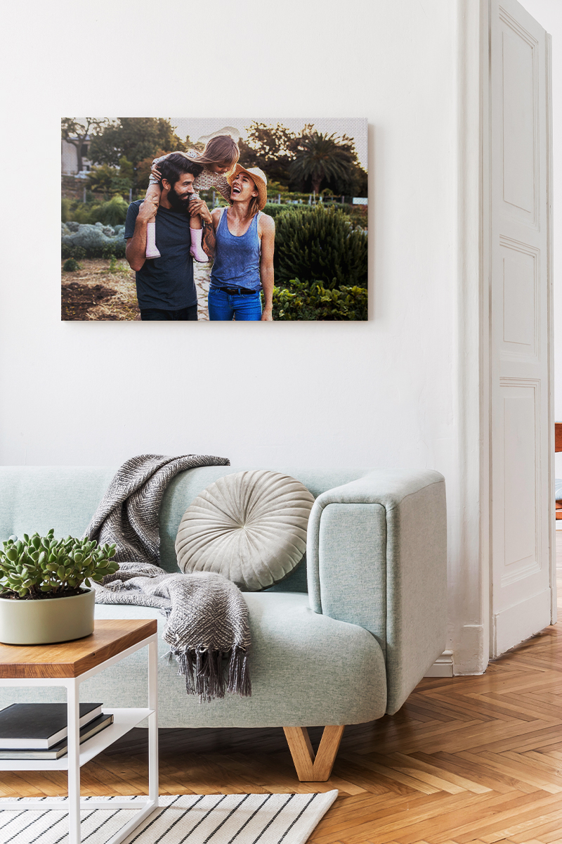 Canvas print of family on vacation in living room
