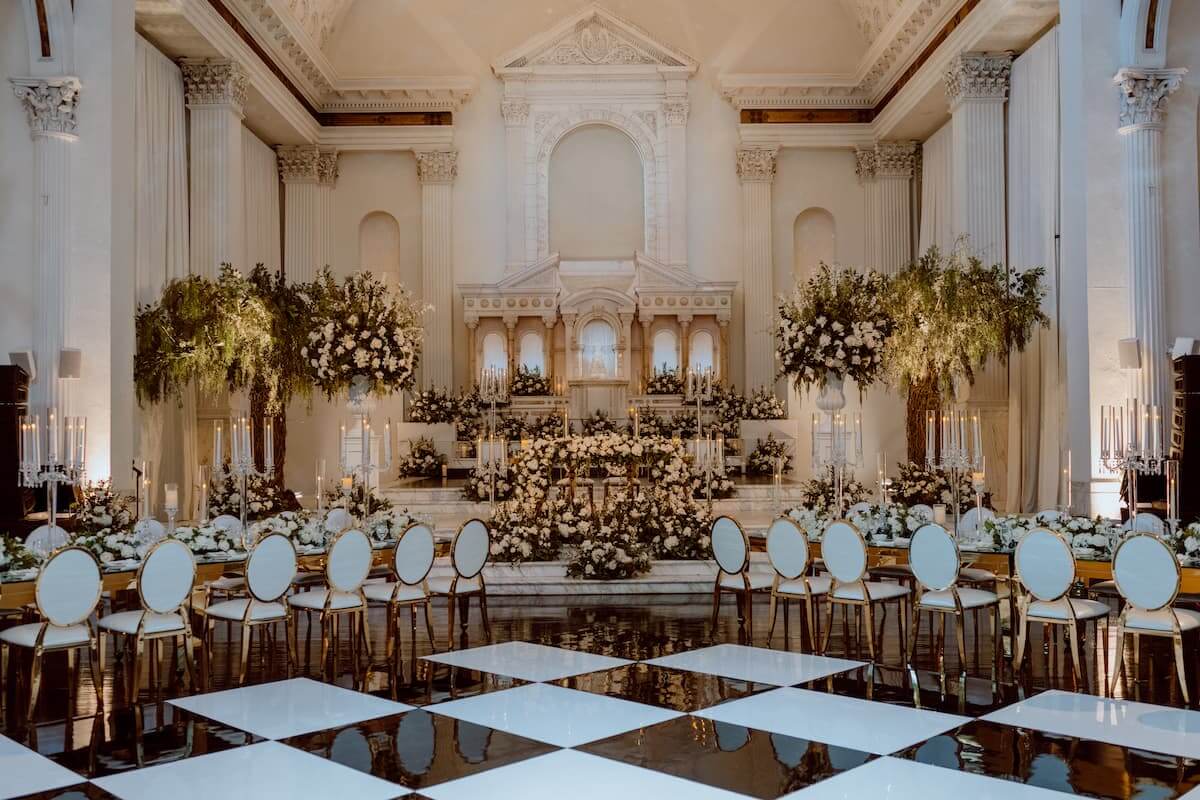 white chairs with altar 