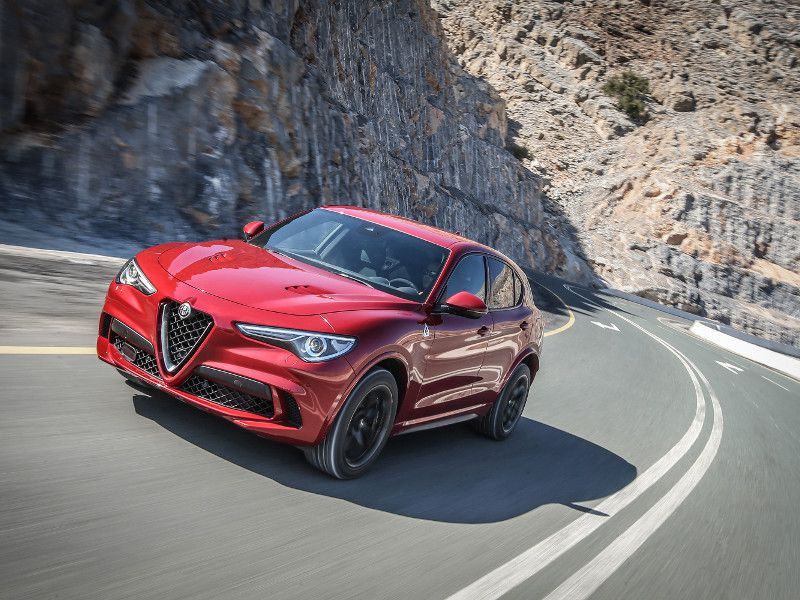 2019 Alfa Romeo Stelvio Quadrifoglio red drivng ・  Photo by Newspress USA