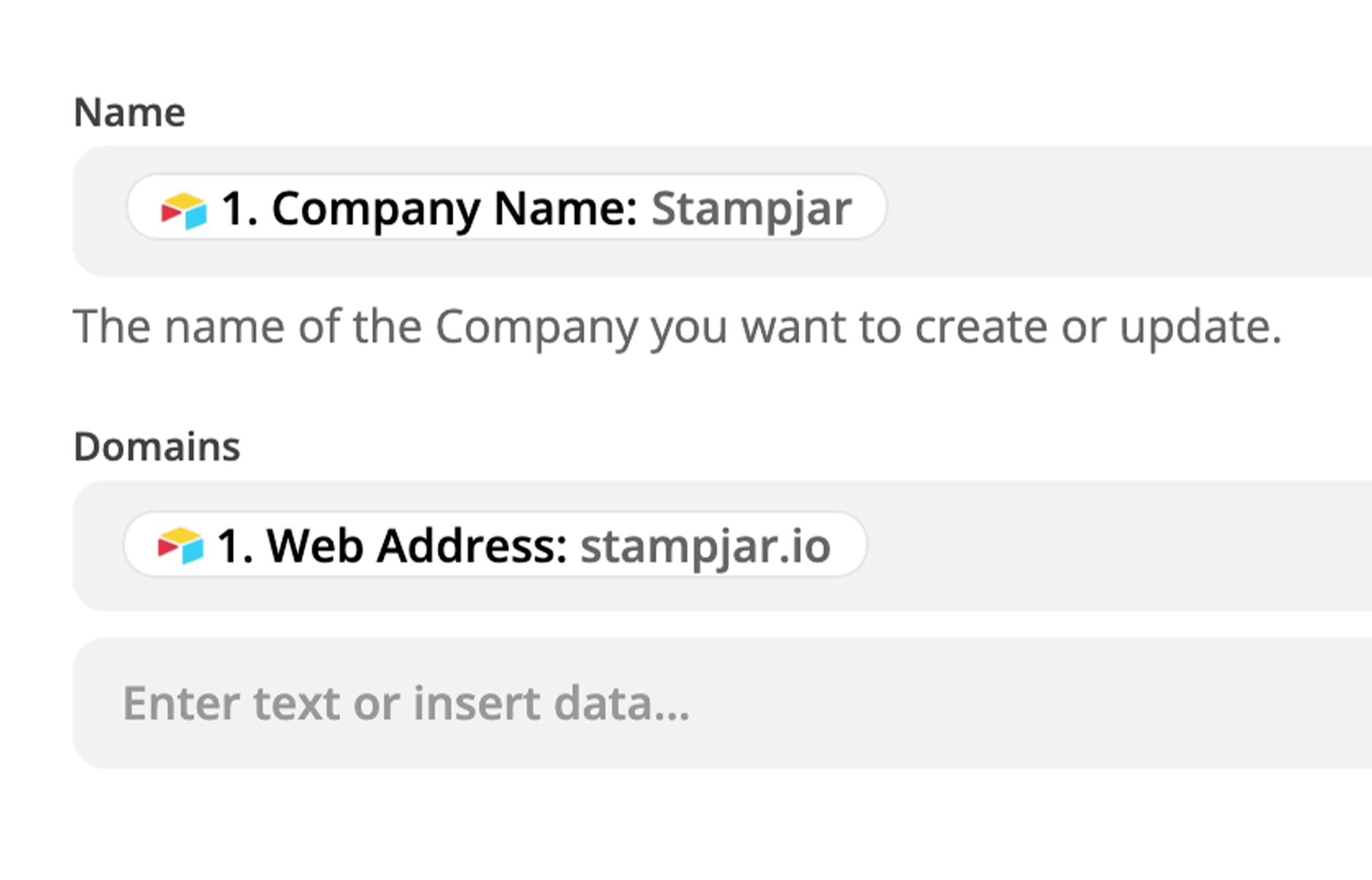 Another action step in Zapier, this time creating a new company record. The example company name is given, along with its web address.