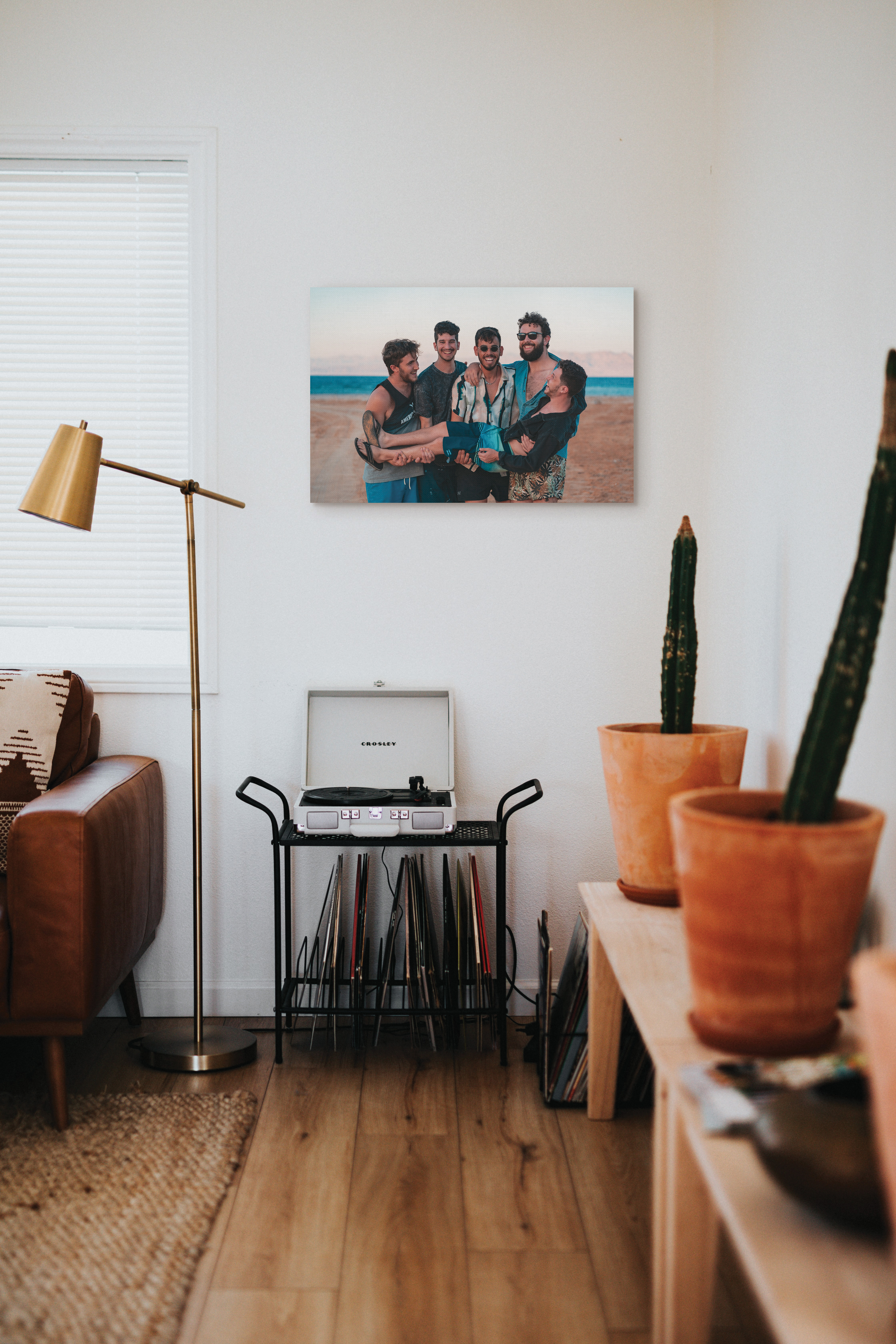 Framed print of friends in living room