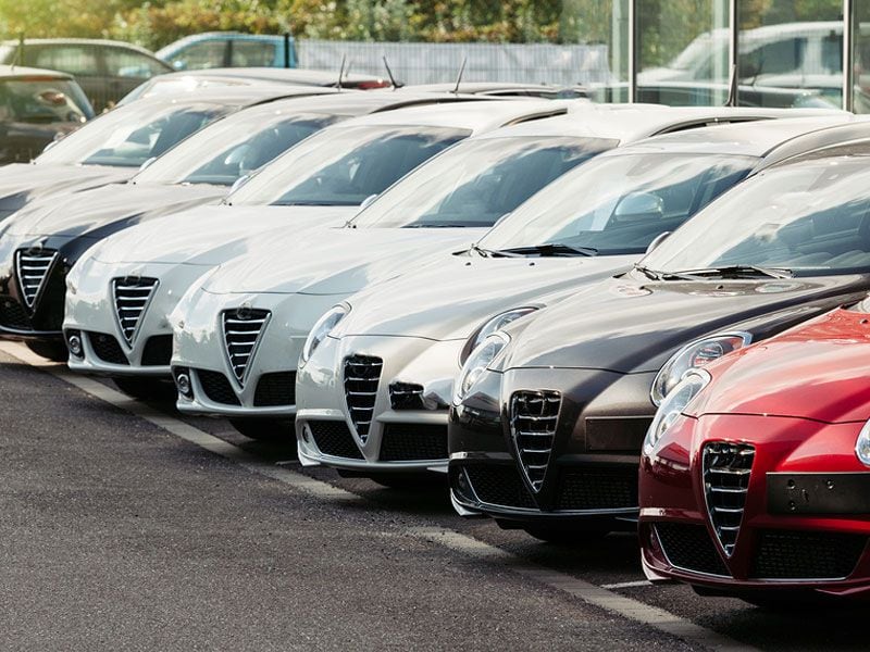 bigstock Cars on dealership lot ・  Photo by Bigstock 