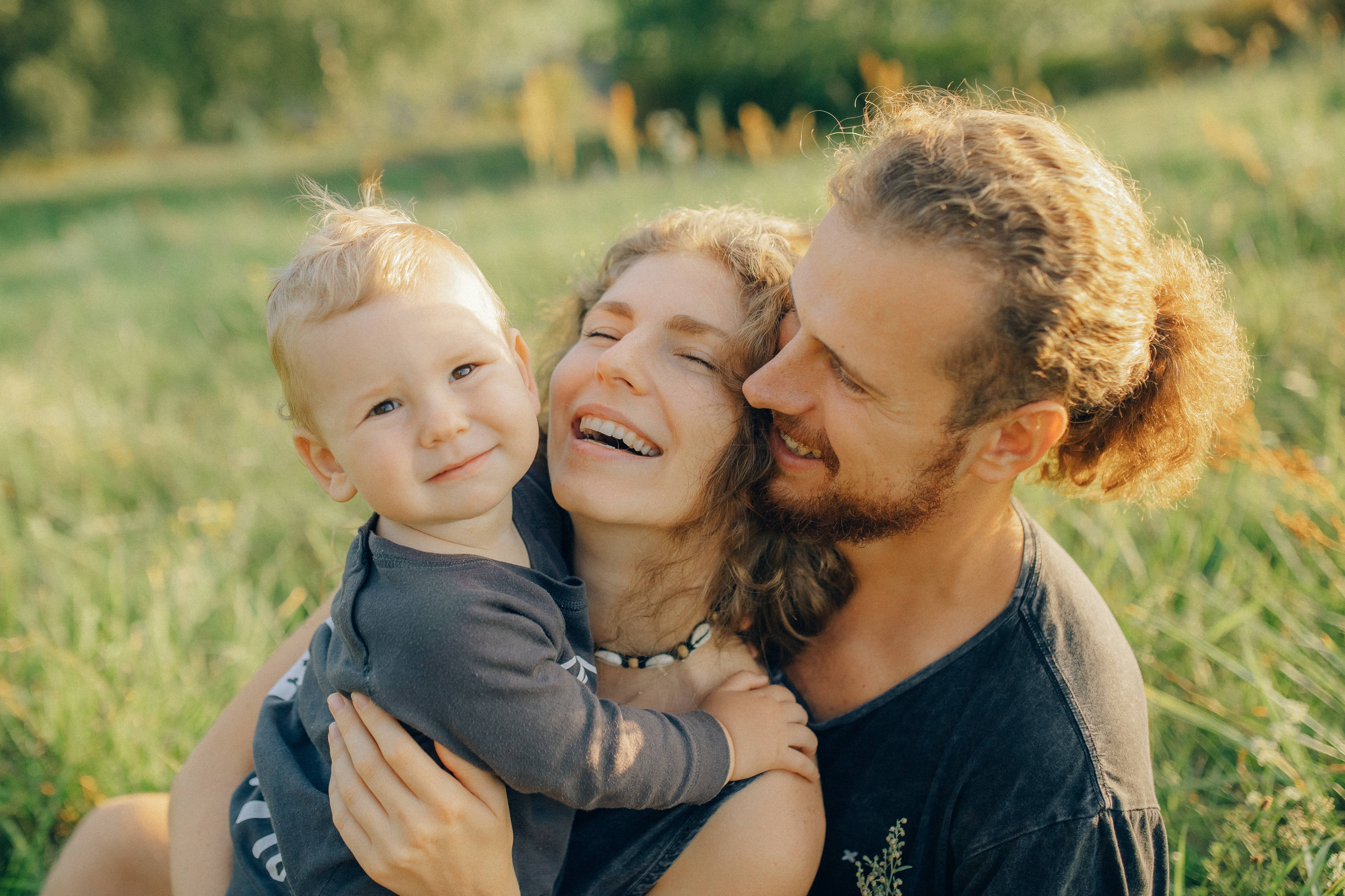 Family portrait of mother, father, and son