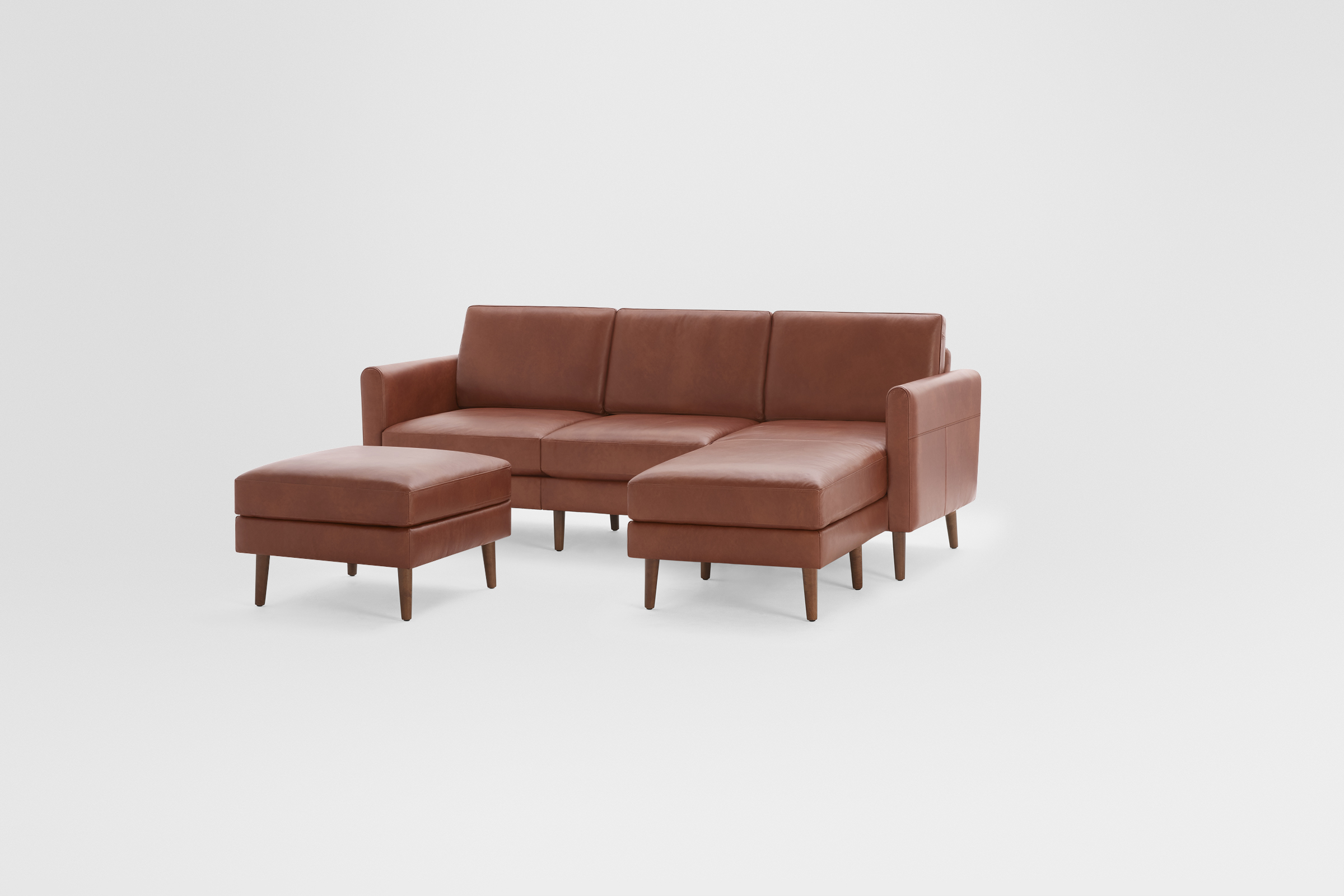 The Nomad Leather Sectional with Ottoman Burrow