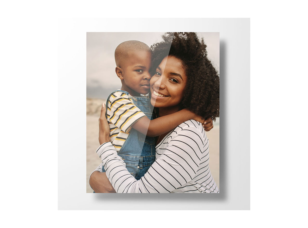 A portrait of a mother and her son depicted on a premium metal print