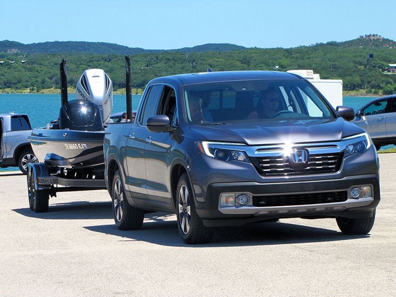 2017 Honda Ridgeline towing boat ・  Photo by Ryan ZumMallen