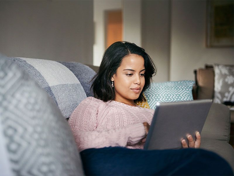 iStock woman web surfing on laptop 