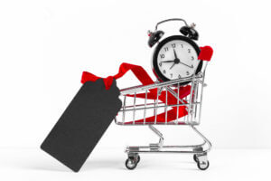 mini shopping cart with alarm clock and price tag