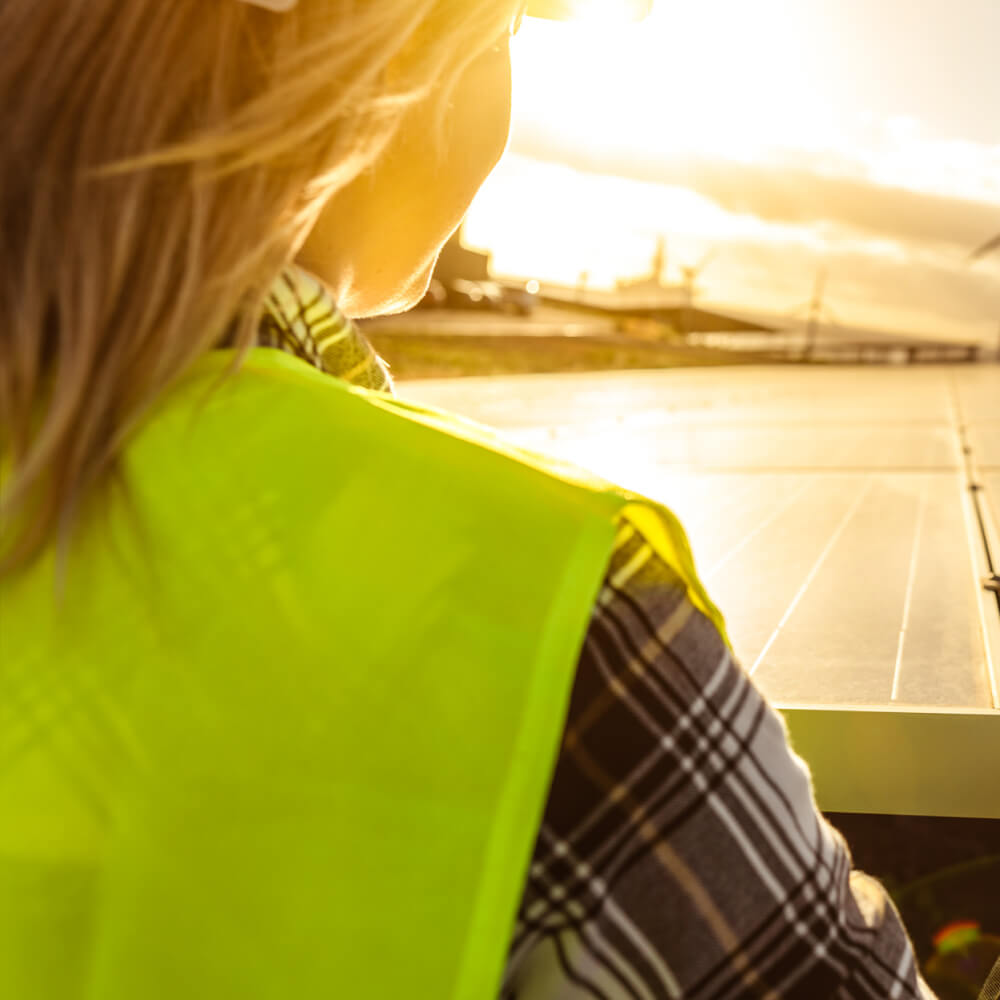 Female tradies installing solar