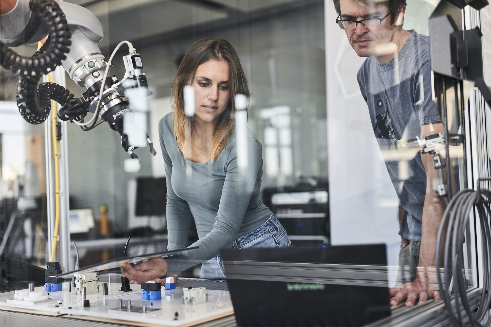 corporate portraits and reportage with employees at robotics lab in Munich