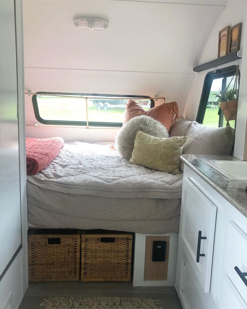 Painting your RV bedroom a light color really opens up and brightens the space.