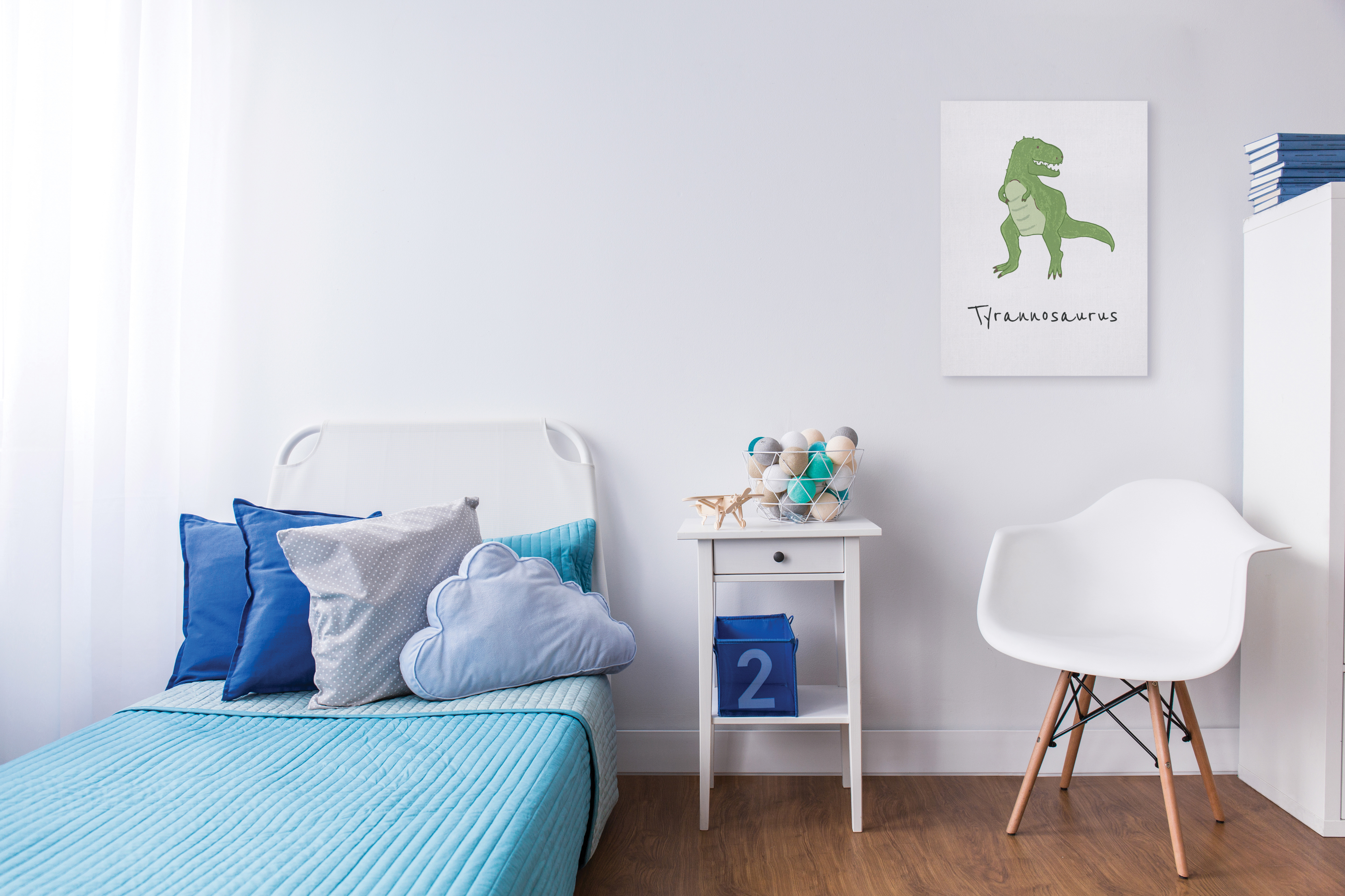 Dinosaur wall art in child's bedroom