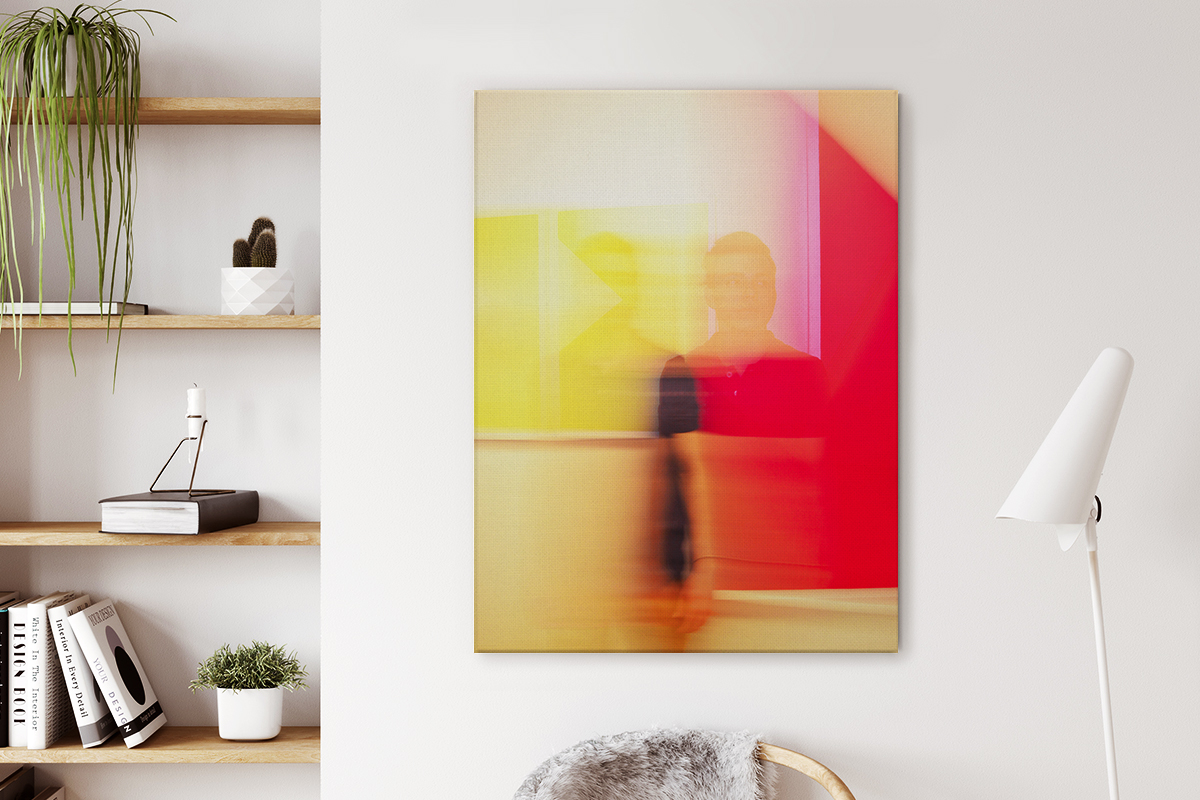 Canvas print of abstract art hanging on wall