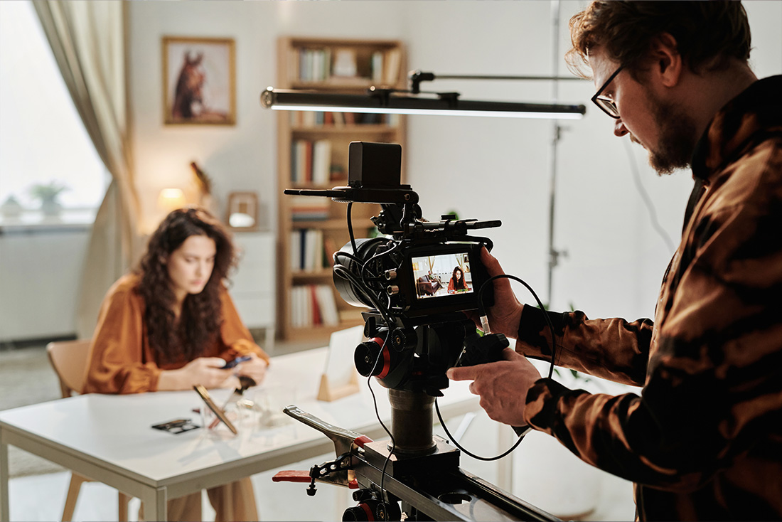 camera operator with film camera on movie set.jpg